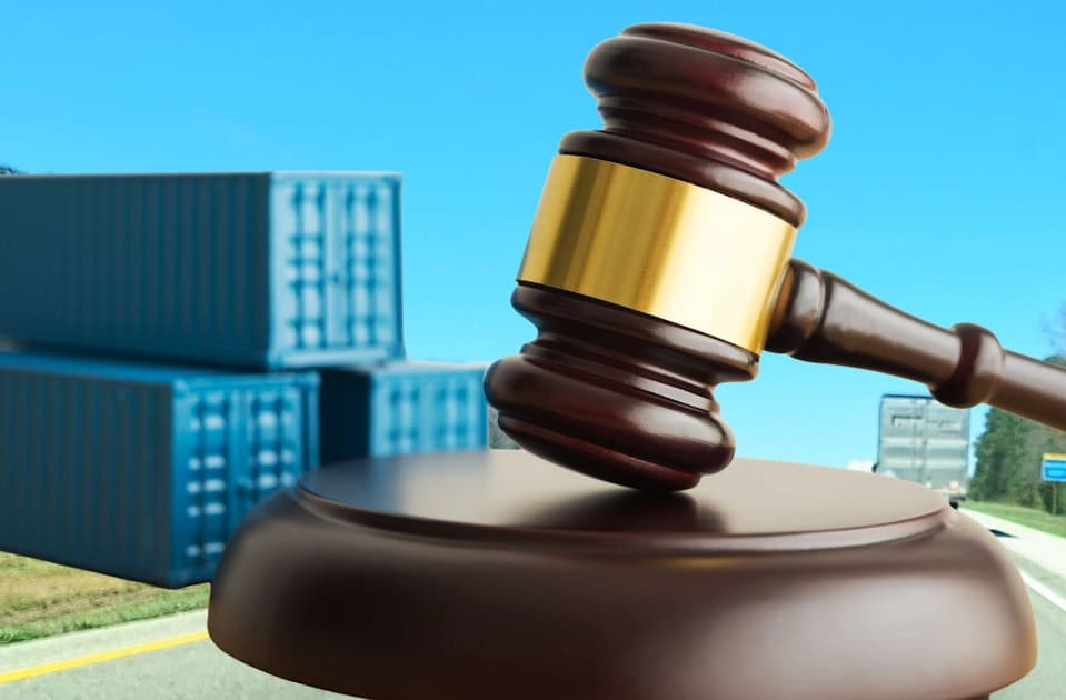 Gavel and contract documents on a desk