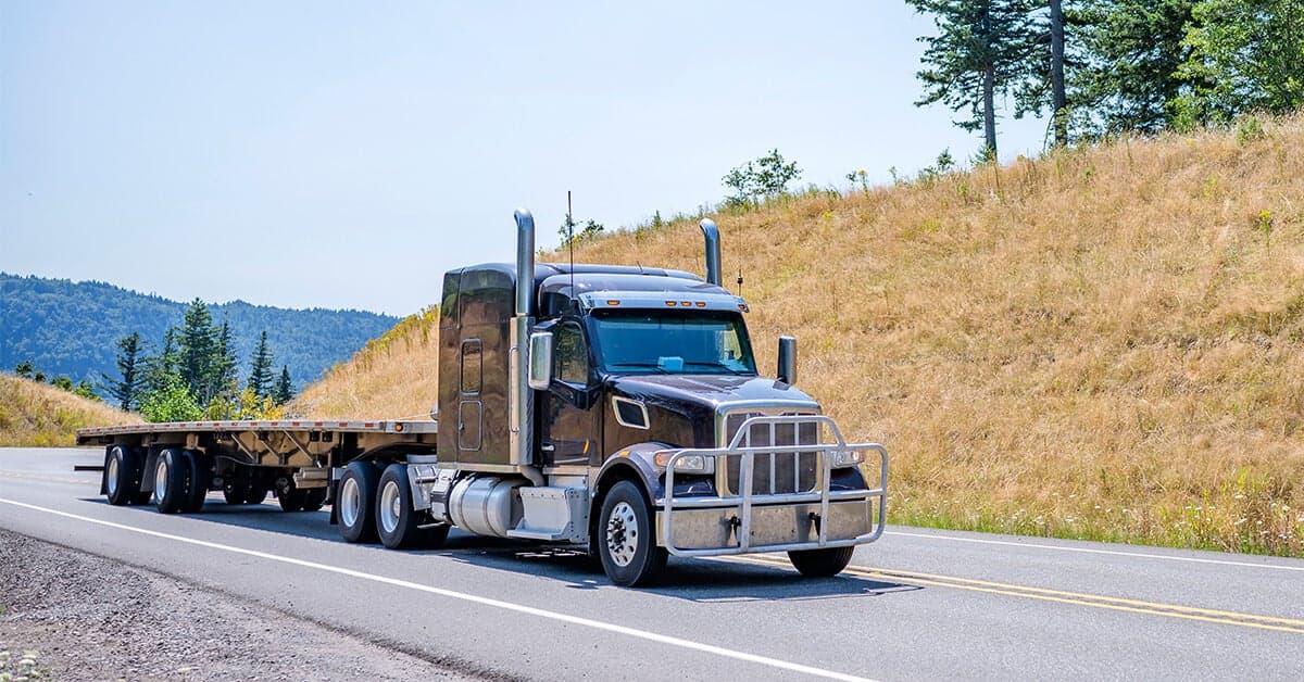 Flatbed truck carrying cargo