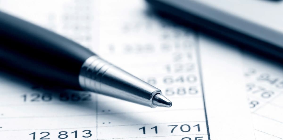 Owner-operator reviewing financial records in the cab
