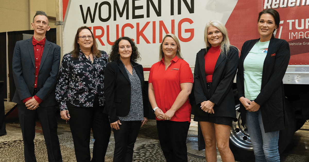 Volunteers at trucking industry event