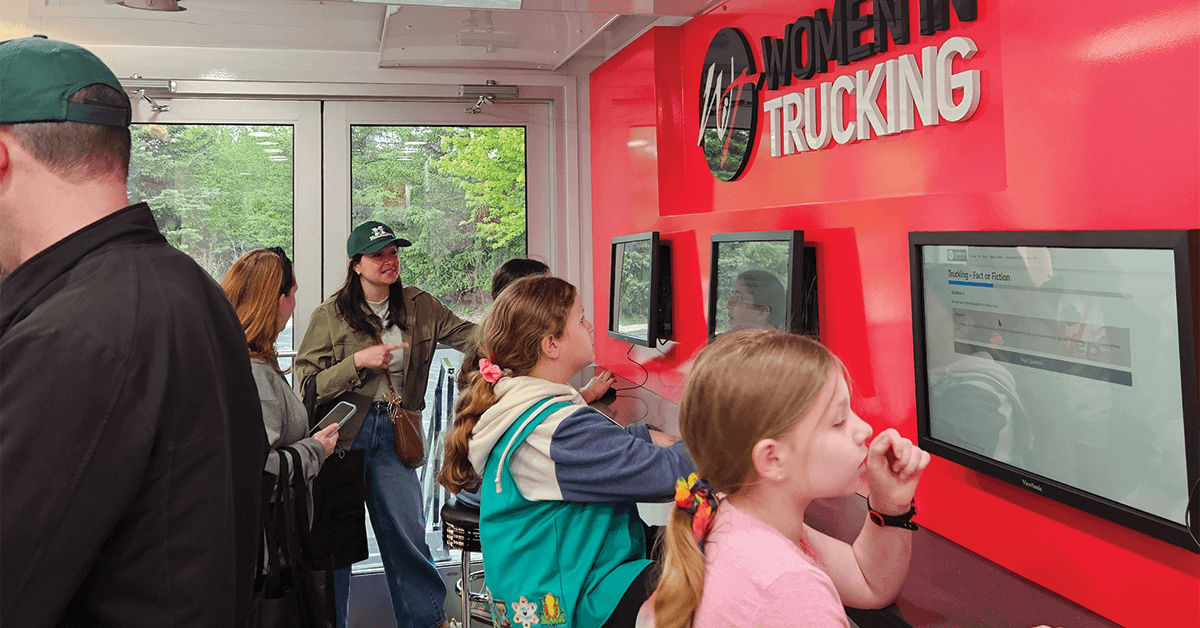 Girl Scouts learning about trucking careers