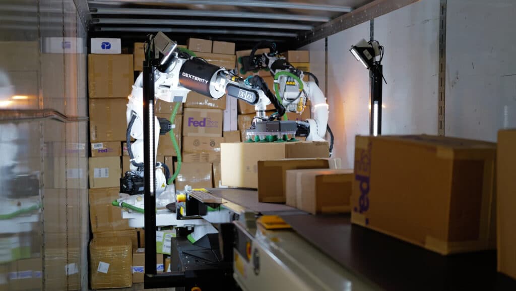 Autonomous system loading a trailer at a distribution dock