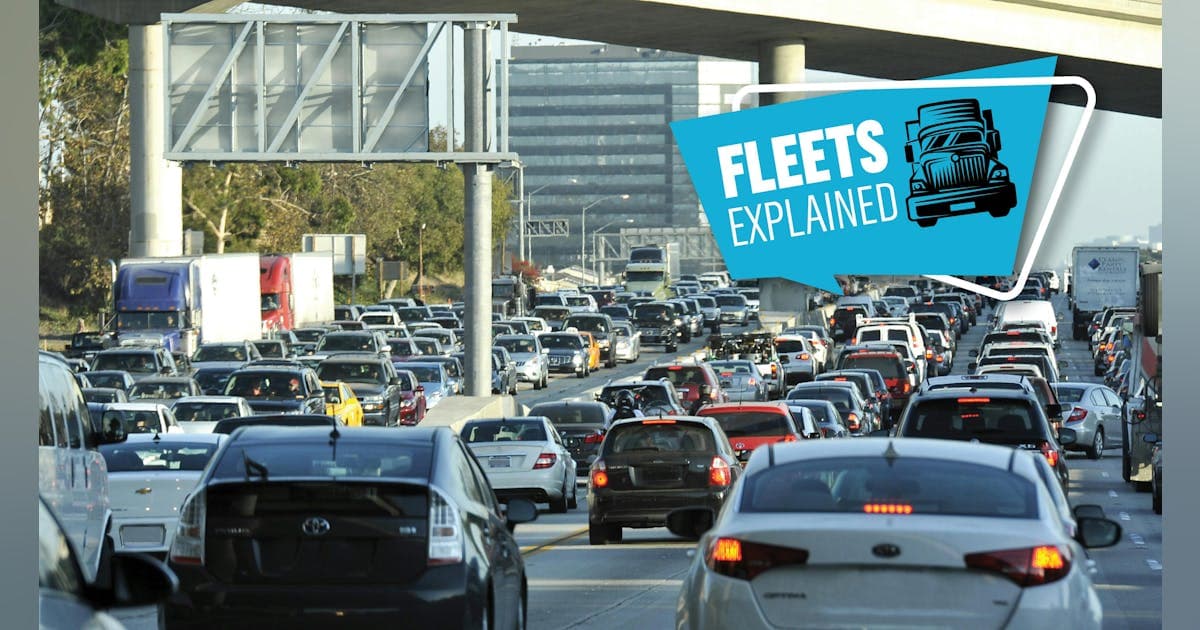 Congested highway with trucks at rush hour