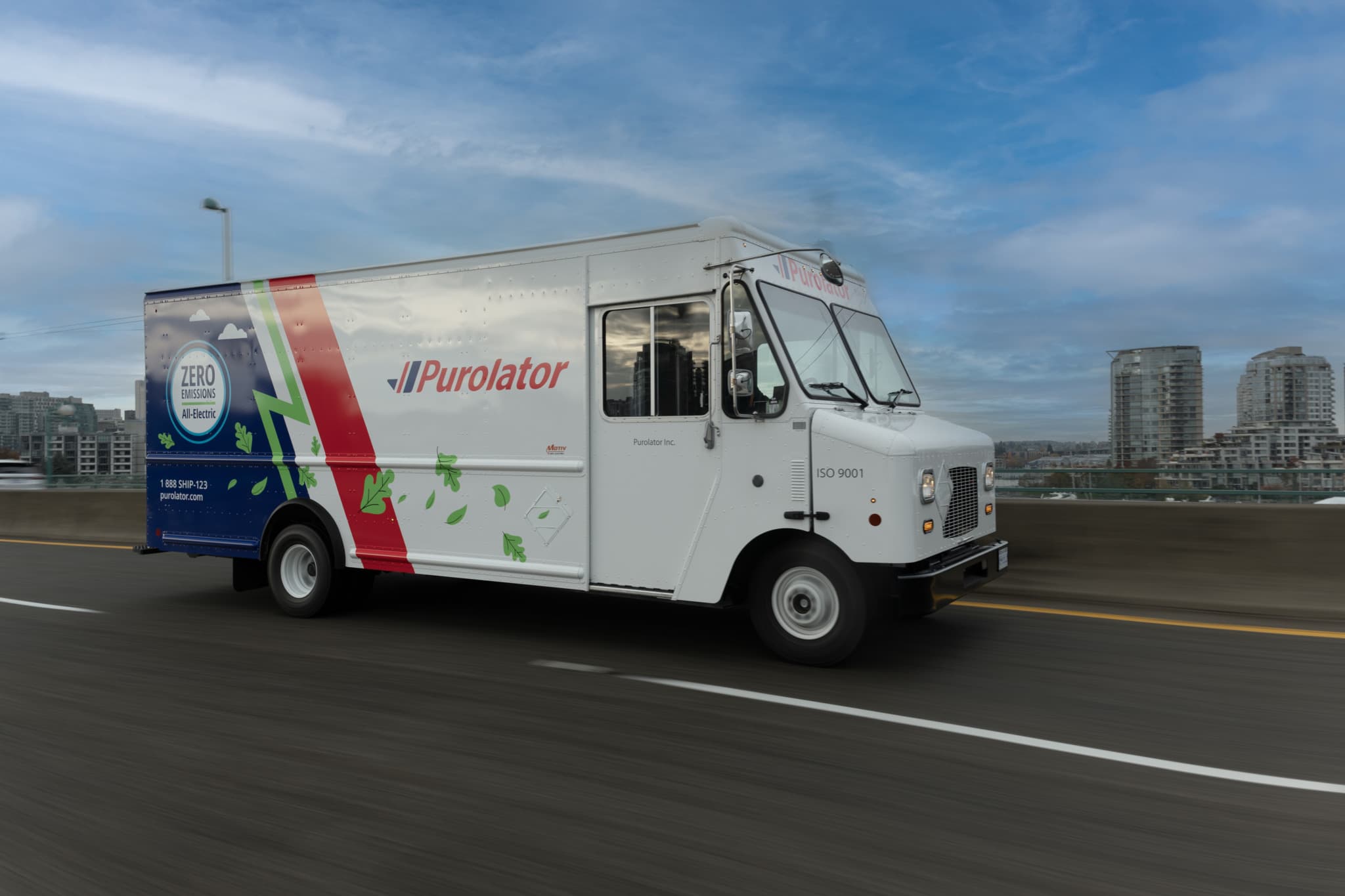 Electric delivery van on a city street